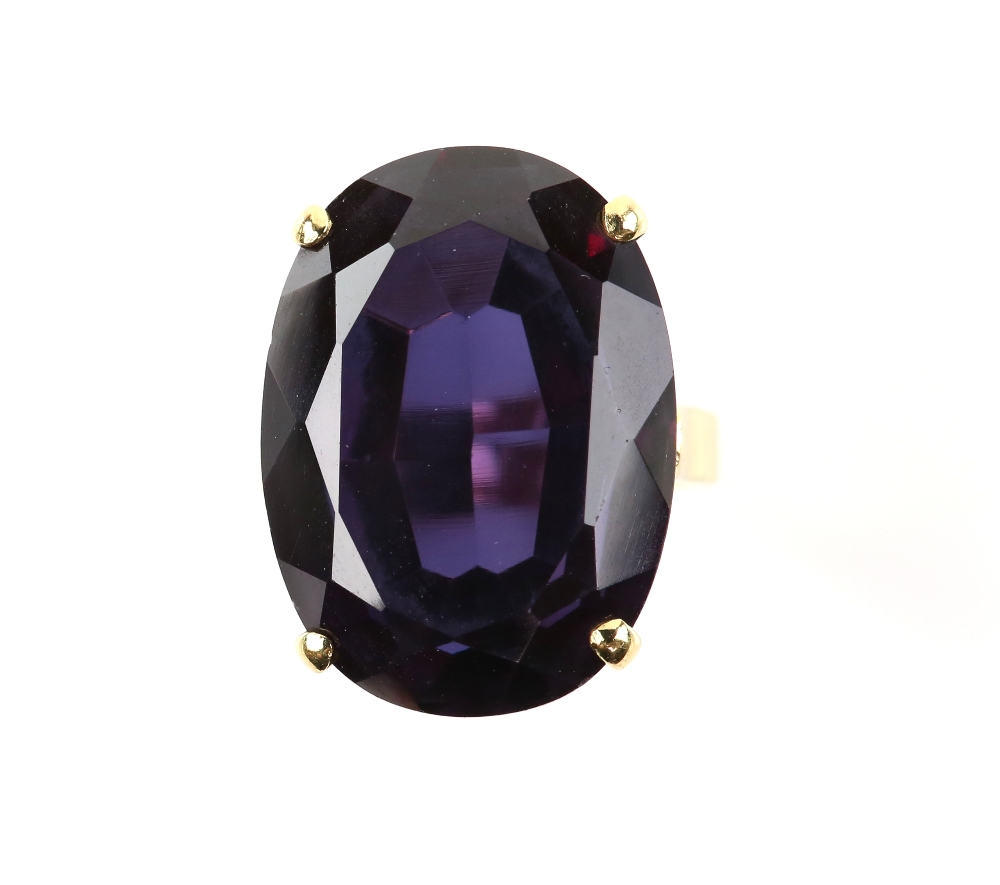 Single stone synthetic corundum ring, oval cut synthetic corundum measuring an estimated 22.5 x 16.4