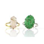Carved jade oval panel ring, size R and oval cabochon cut opal dress ring, size M, both claw set and