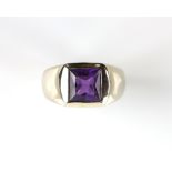 Modern amethyst ring, central square cut amethyst, estimated weight 2.26 carats, mounted in 9 ct,