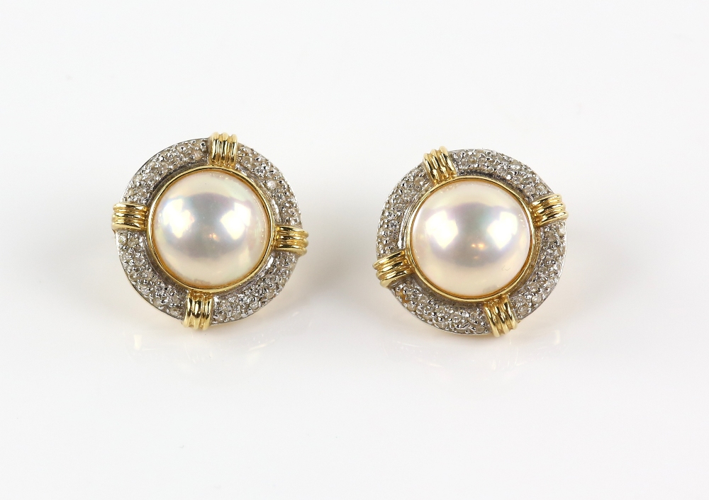 Pair of Mabe pearl and diamond earrings, each set with a large Mabe pearl encompassed by a