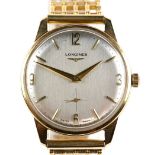 Longines, a gentleman's gold wristwatch, with signed silvered dial, baton hour markers, gold hands