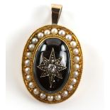 Victorian pendant, oval cabochon cut garnet with central old cut diamonds and rose cut set star,