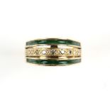 Vintage enamel and diamond ring, with a concave line of green enamel set in the outer rows, with the