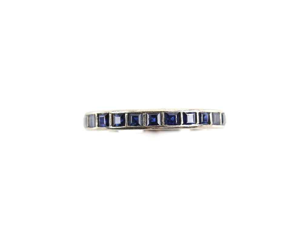 1920's blue sapphire full eternity ring, square step cut sapphires in channel setting, mount testing