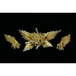 George Weil vintage diamond spray brooch, set with round brilliant and baguette cut diamonds,