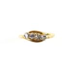 Antique diamond twist ring, set with four old cut diamonds, estimated total diamond weight 0.40