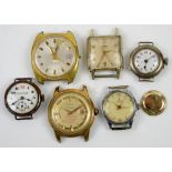 Silver wrist watch, bearing Swiss and German marks, white enamel dial with Arabic numerals and