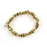 Gold fancy link bracelet, oval and figure of eight links, with concealed sliding heart clasp, with