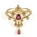 Edwardian pendant brooch, with a central cushion cut pink tourmaline, estimated weight 2.55