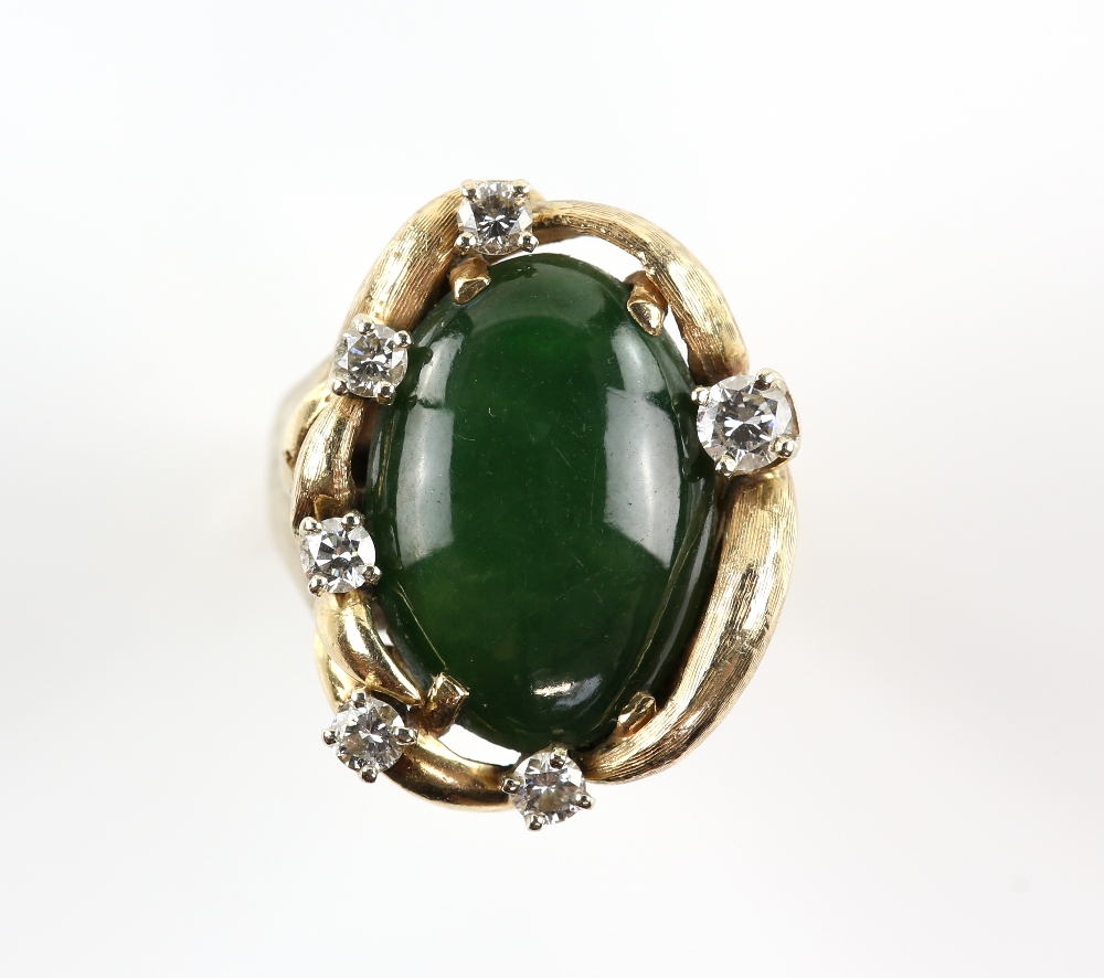 Nephrite jade and diamond ring, oval cabochon cut nephrite measuring an estimated 19.8 x 13.8 x 4.