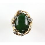 Nephrite jade and diamond ring, oval cabochon cut nephrite measuring an estimated 19.8 x 13.8 x 4.