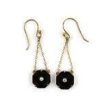 A pair of onyx and diamond drop earrings, octagonal cut onyx panels each centrally set with a