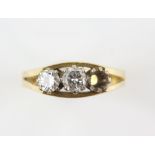 Round brilliant cut diamond three stone ring, estimated total diamond weight 0.56 carats, ring