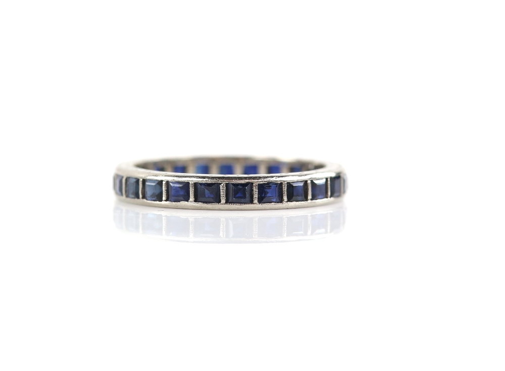 1920's blue sapphire full eternity ring, square step cut sapphires in channel setting, mount testing - Image 2 of 2