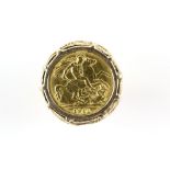 Gold ring with pierced shoulders, marked for 9 ct, set with a King George V half, 1911, ring size