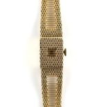 Continental Geneva Ladies gold wristwatch, the hinged dial cover opening to reveal a signed square