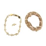 Gold Figaro chain, measuring an estimated 51.5cm, together with a fancy link bracelet, with a