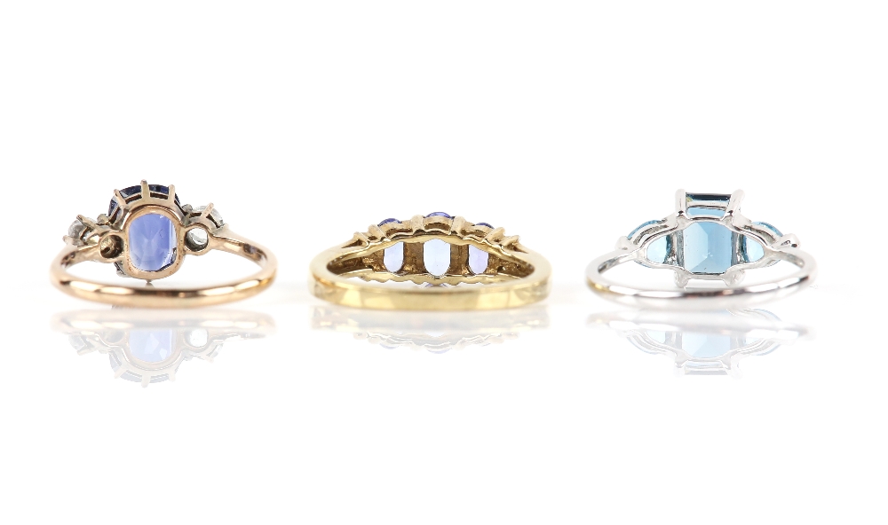 Three gem set rings, including a synthetic blue sapphire and white sapphire three stone ring, size J - Image 2 of 2