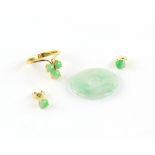 Jade trefoil ring, size M 1/2, and a pair of matching circular cabochon jade earrings with post