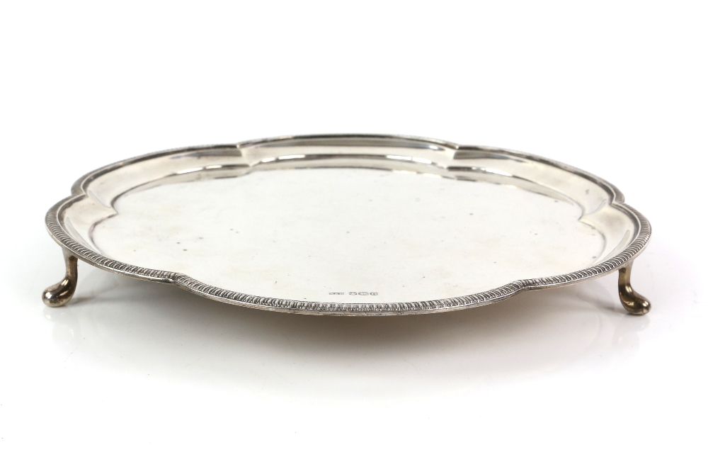 Modern silver salver with six lobes, on three pad feet, by Roberts & Dore Ltd., Sheffield, 1956, - Image 2 of 4