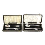 George V/VI cased silver two-piece christening sets comprising fork and spoon, one by A S P and