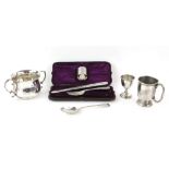 Victorian silver christening set comprising knife, fork, spoon and napkin ring, by Goldsmiths'