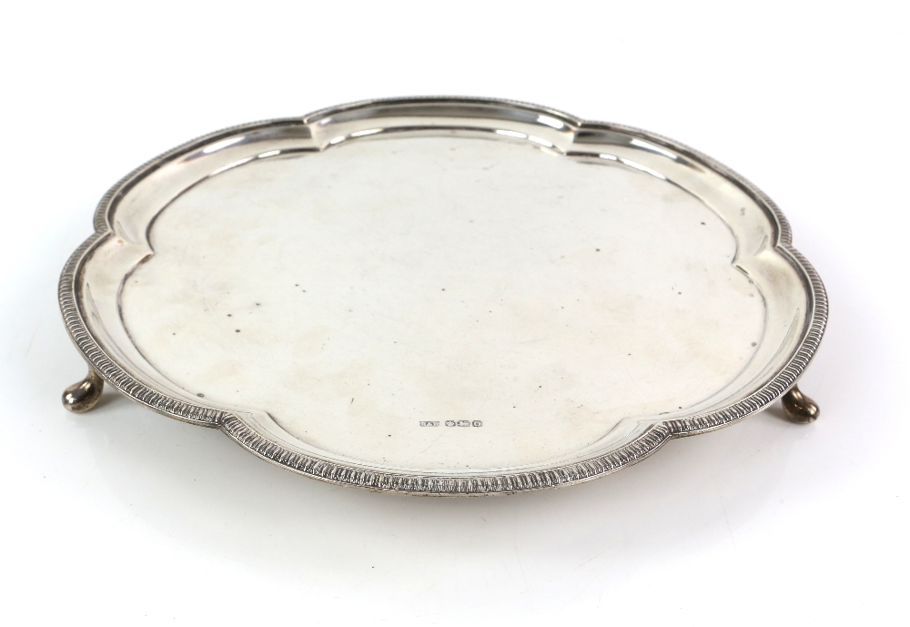 Modern silver salver with six lobes, on three pad feet, by Roberts & Dore Ltd., Sheffield, 1956, - Image 4 of 4