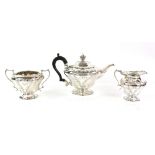 AMENDED DESCRIPTION Edward VII silver three piece tea service, comprising teapot, cream jug and