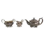 Near matched George III/Victorian silver three piece tea service, comprising teapot, cream jug and