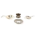 Two silver tea strainers, a silver napkin ring and an 800 grade silver shell dish, largest