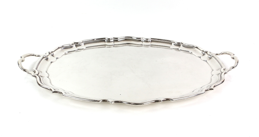 George V silver two handled tray, by Cooper Brothers & Sons Ltd, Sheffield 1930, with shaped border,