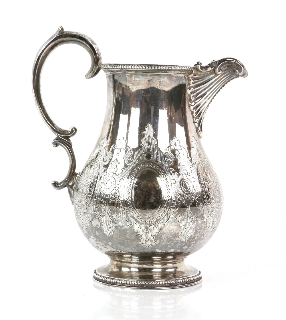 Victorian silver cream jug with engraved decoration, beaded border and foot, by Barnard & Sons Ltd.,