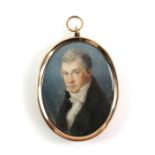 19th century portrait miniature depicting a gentleman with greying hair wearing a cravat, painted on
