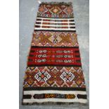 Hand-woven tribal runner, with polychrome geometric motifs, fringed, 220 x 84cm