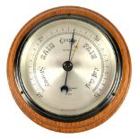 Negretti & Zambra compensated aneroid barometer, the silvered register marked 'Negretti & Zambra,