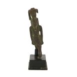 Fragmentary bronze figure of Nefertum wearing the shendyt kilt and the lotus crown, late period