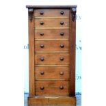 19th century mahogany and pine wellington chest with seven graduated drawers on plinth base. 113H