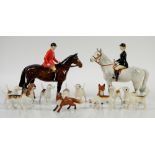 Beswick Huntsman and Huntswoman, 20cm, together with 9 foxhounds and two foxes