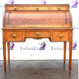 Early 20th century walnut veneered cylinder bureau by Maple and Co Ltd, with gallery above three