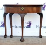 19th century reproduction mahogany demi lune card table with a single drawer raised on cabriole legs