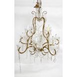 Gilt metal and cut glass twelve branch chandelier with floral glass drops, H67cm Diameter 75cm