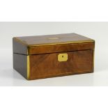 19th century walnut and brass bordered writing slope, the hinged top opening to reveal a velvet