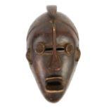 An imposing Ngbaka anthropomorphic face mask, DRC, H41cm x W24cmThis mask is usually worn by members