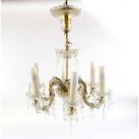 Six branch gilt metal and cut glass chandelier with cut glass floral drops and flower heads,