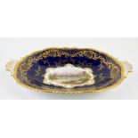 Coalport oval two handled dish in cobalt with gilt decoration, the centre hand-painted with a