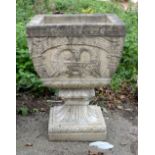 Large composite stone footed planters with relief scrolling floral decoration, H75 x W55 x D55cm