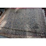 Antique Persian carpet, with repeating stylised floral motifs within multi floral borders, 321 x