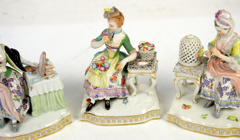 AMENDED DESCRIPTION Three Meissen figure groups each one modelled as a lady seated at a table, - Image 3 of 4