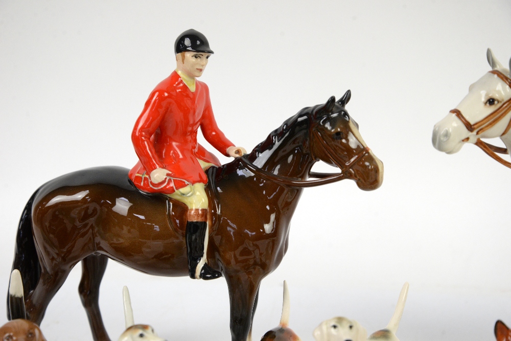 Beswick Huntsman and Huntswoman, 20cm, together with 9 foxhounds and two foxes - Image 3 of 5