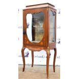 20th century gilt metal mounted mahogany display cabinet with floral inlaid decoration raised on